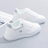 Zapatillas blancas elegantes de comodidad ligera