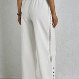 Shania - Pantalones Relaxed con Detalles de Botones