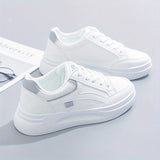 Zapatillas blancas elegantes de comodidad ligera